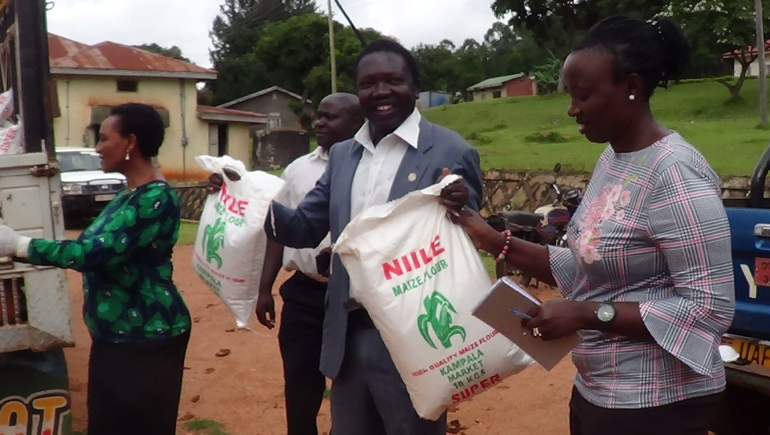 Read more about the article Kibaale District MPs Donate Maize Flour and Beans to District Covid-19 Taskforce